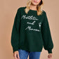 Mistletoes and Mimosas Oversized Sweater